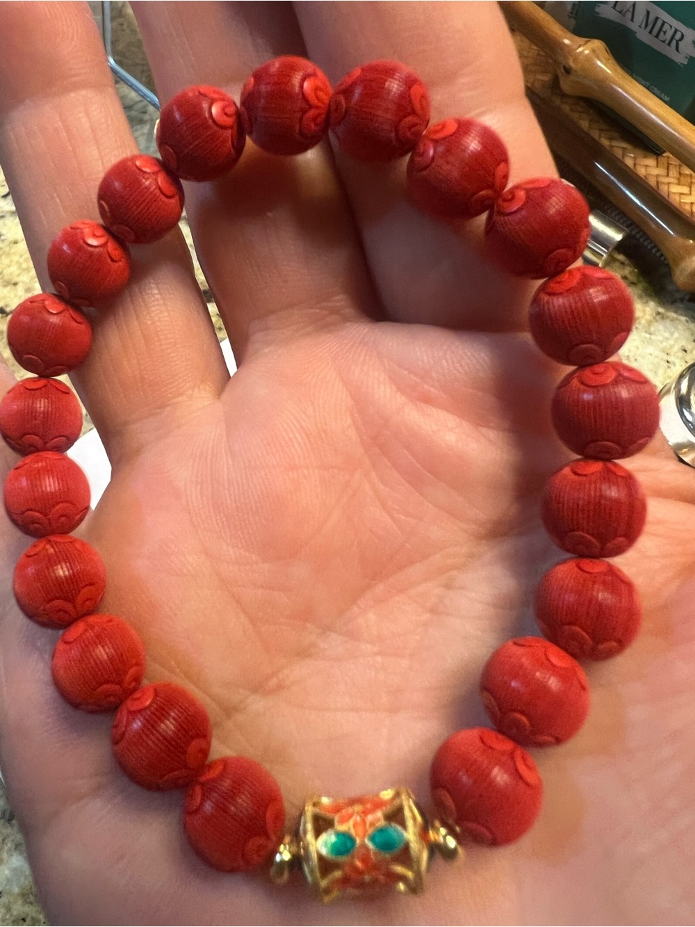 Red Carved cinnabar Bead Bracelet with Gold Accent
